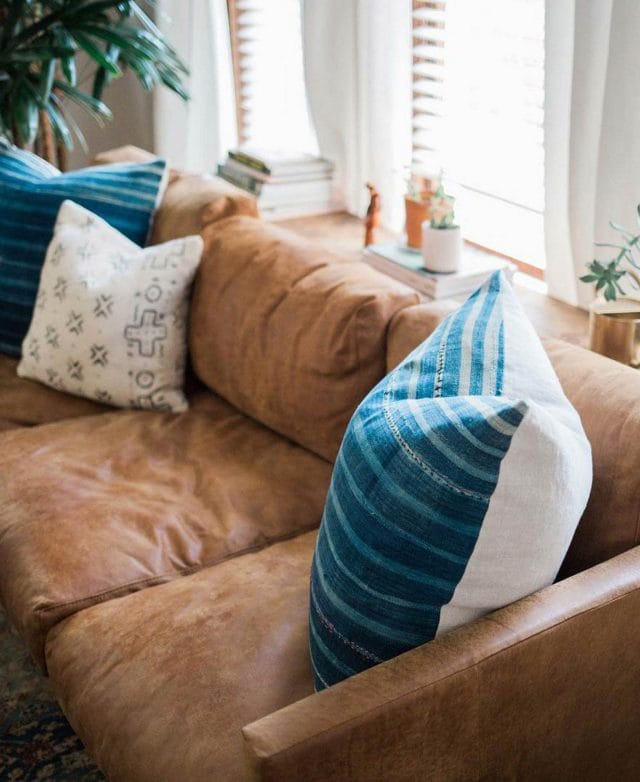 Close-up of Article leather sofa in Emily Suenetz's home